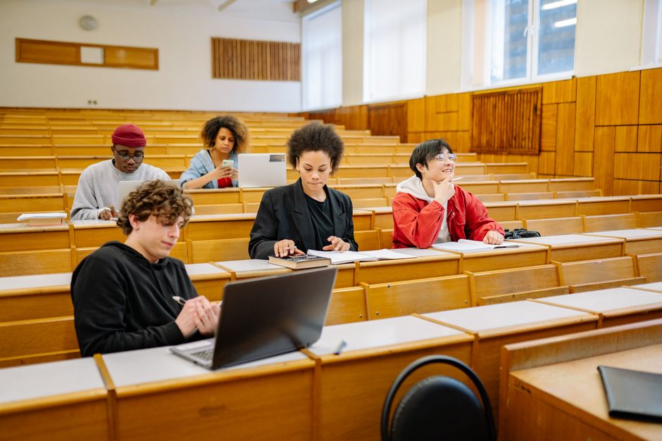 Students learning with laptops